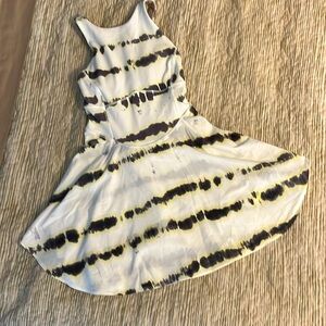 Lululemon NWT court crush dress. White with gray and yellow print. Size 2